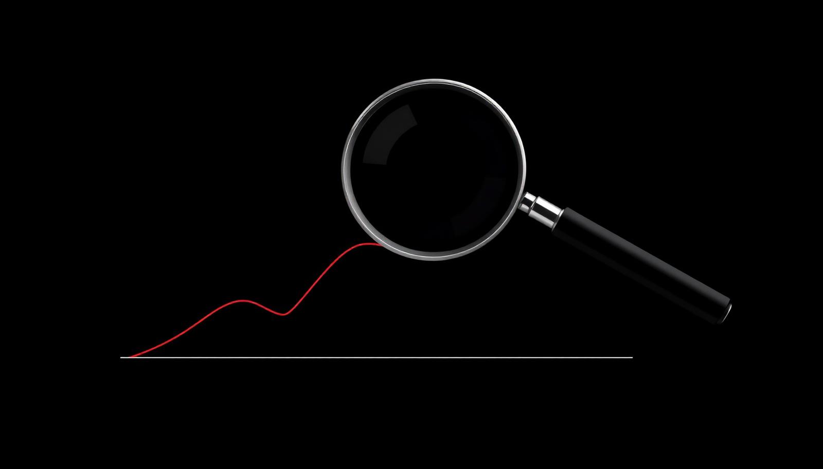 Magnifying glass over a thin red performance line on a near-black background.